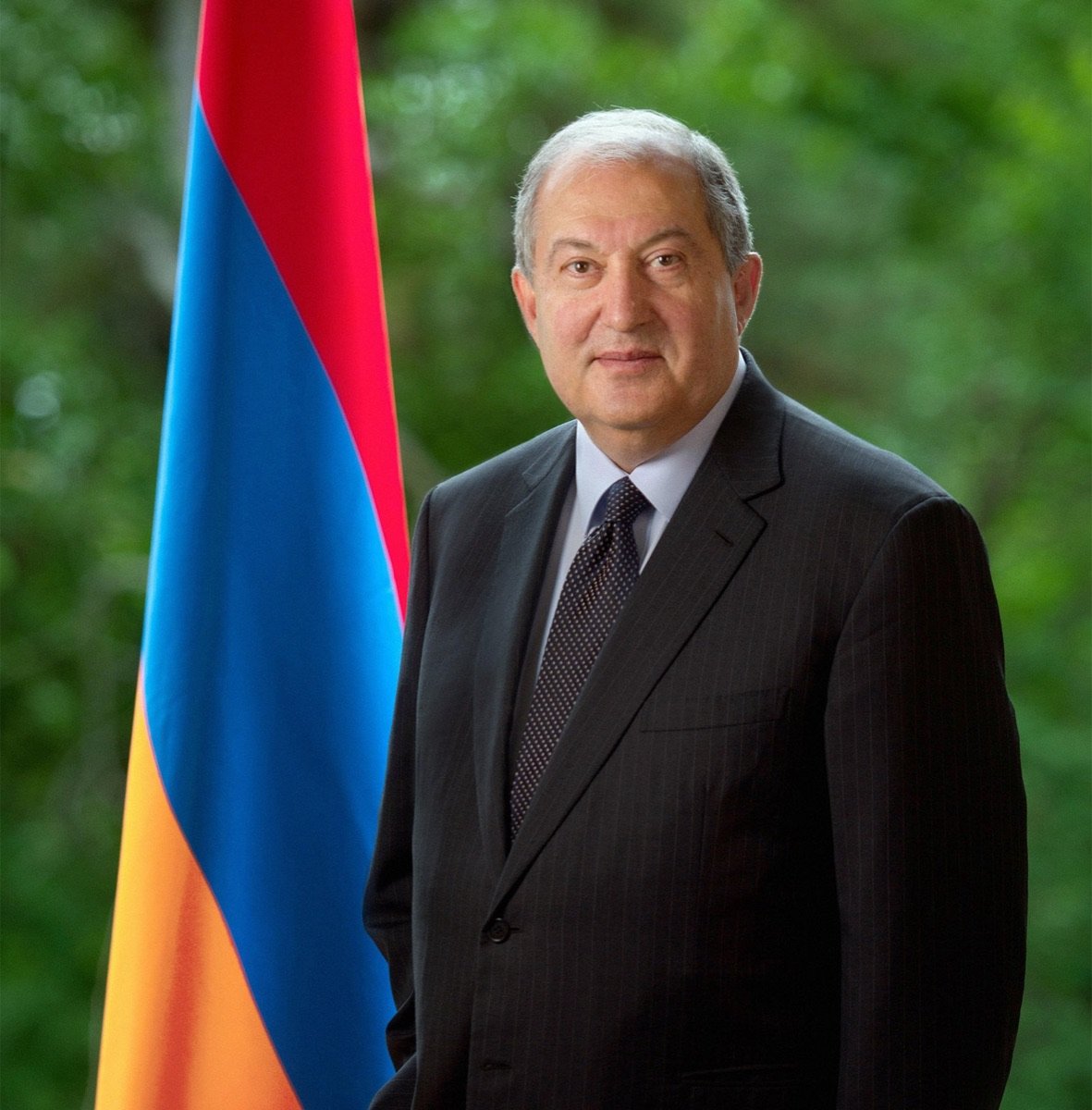 Armen Sarkissian, President of the Republic of Armenia 2018–2022, official portrait with the Armenian flag